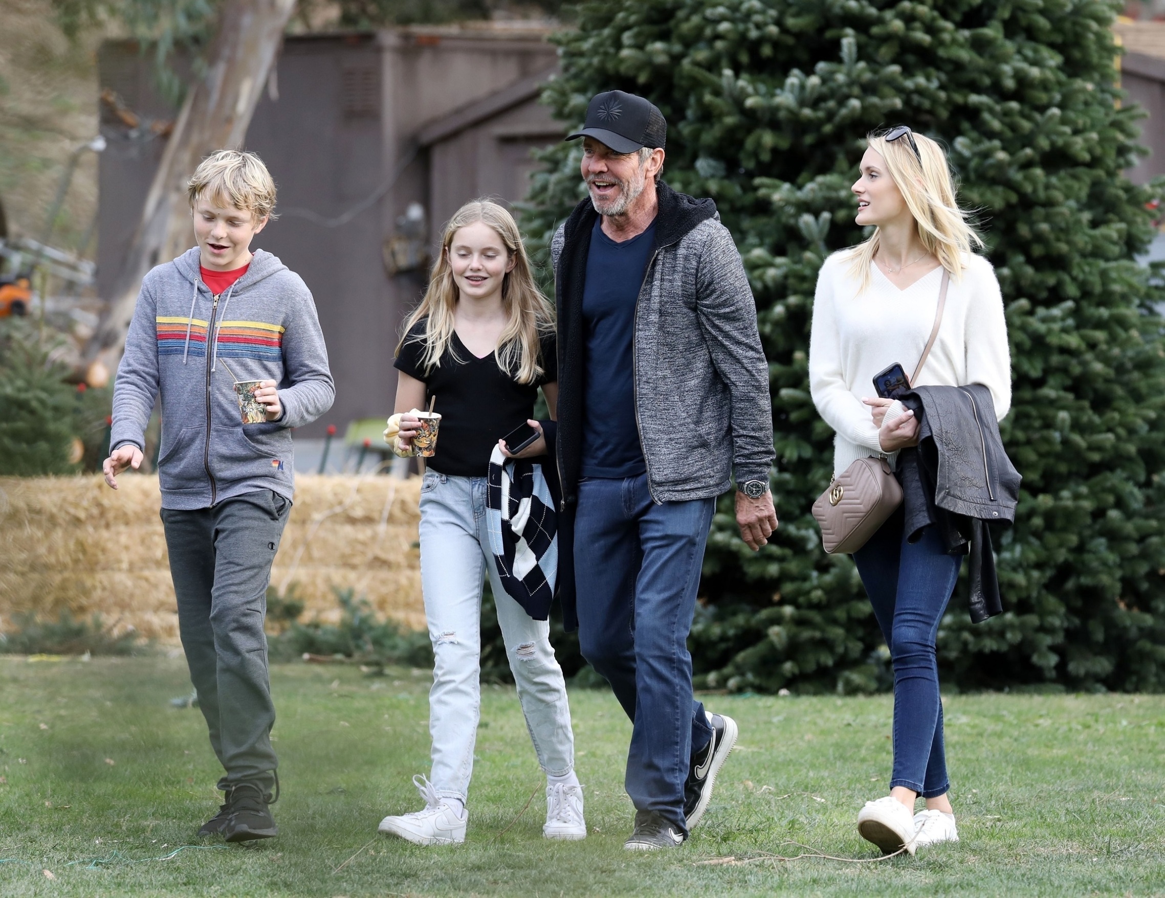 Pacific Palisades, CA  - *EXCLUSIVE*  - Dennis Quaid and his fiancée Laura Savoie go Christmas tree shopping with his two kids, Zoe and Thomas. The 'Midway' actor got into the holiday spirit, smiling and sticking his head into a snowman cutout for a photo op with his kids.

BACKGRID USA 1 DECEMBER 2019,Image: 485868582, License: Rights-managed, Restrictions: , Model Release: no, Credit line: Clint Brewer / BACKGRID / Backgrid USA / Profimedia